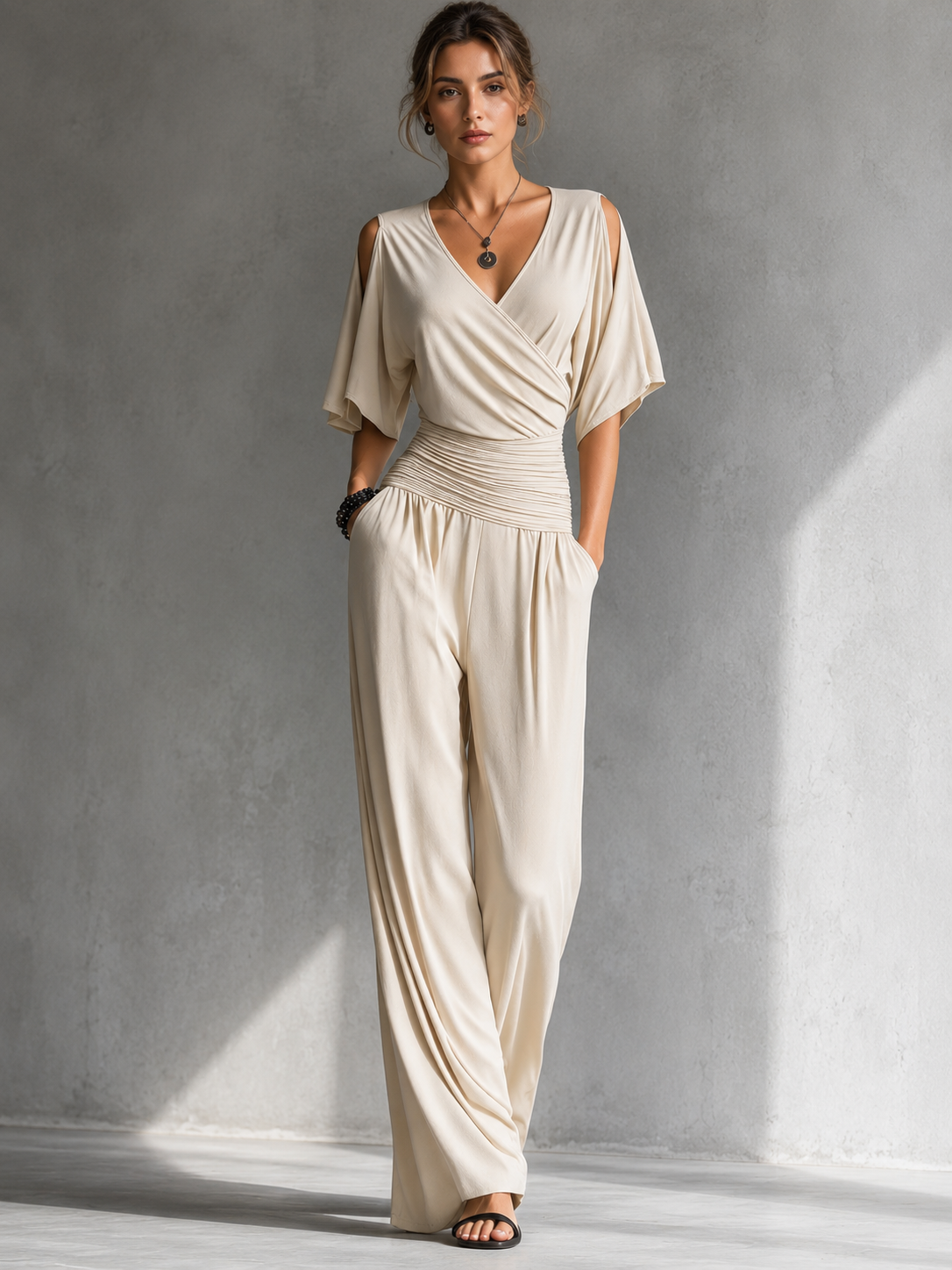 Alsia | Elegante conjunto con efecto cartera y patas anchas.