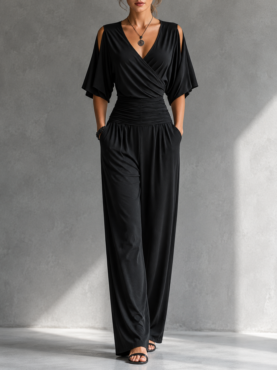 Alsia | Elegante conjunto con efecto cartera y patas anchas.